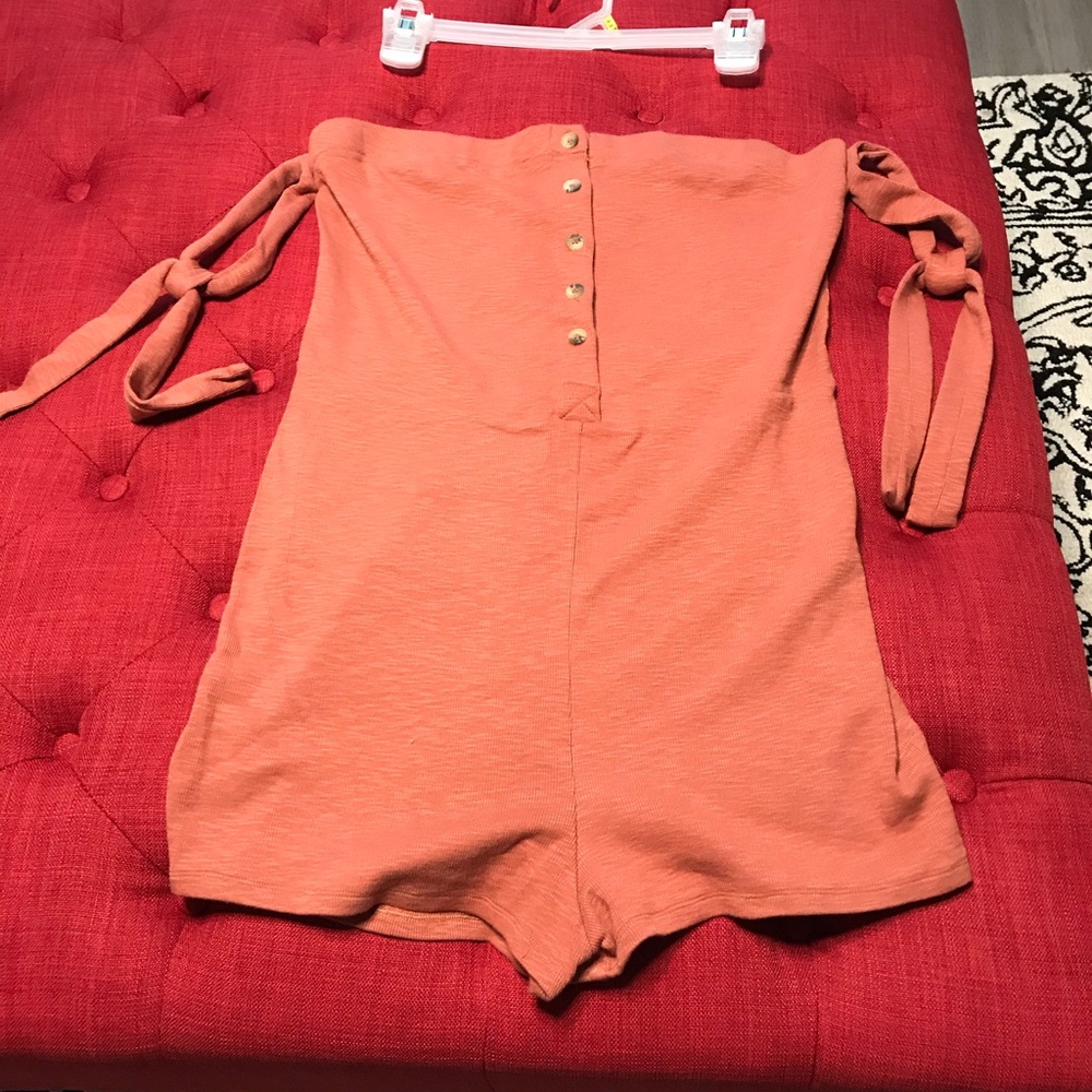 Strapless romper with arm ties, coral/peach color